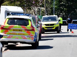 Police in Hampton Street, Cannock, at the scene of the stabbing. Photo: Tim Thursfield