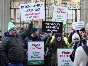 Farmers take part in a protest over the changes to inheritance tax (IHT) rules outside the Oxford Farming Conference, at The Examination Schools, Oxford