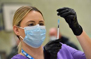  Keeley Ball, practice nurse, with a needle