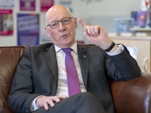 First Minister John Swinney