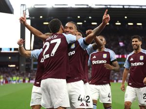 Aston Villa players celebrate scoring