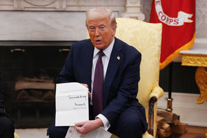 President Donald Trump with his invitation from King Charles for a second UK state visit.