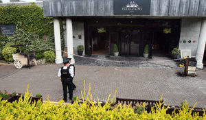 Police outside the entrance to the Everglades Hotel in the Prehen area of Derry-Londonderry, where a bomb was thrown into the reception by a masked man