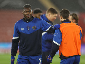 Supporting image for story: Fitness battle for International Shrewsbury Town duo