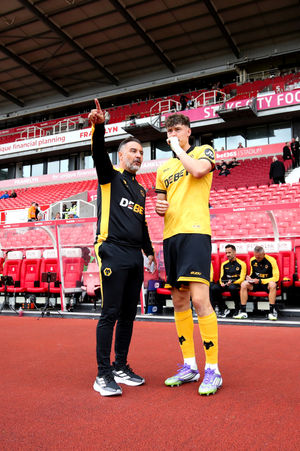 STOKE ON TRENT, ENGLAND - JULY 26: Vitor Pereira, Manager of Wolverhampton Wanderers, interacts with his player Joergen Strand Larsen during the pre-season friendly match between Stoke City and Wolverhampton Wanderers at Bet365 Stadium on July 26, 2025 in Stoke on Trent, England. (Photo by Wolverhampton Wanderers FC/Wolves via Getty Images)
