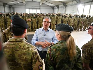 Prime Minister Sir Keir Starmer speaks to troops during a visit to a military base training Ukrainian troops in the west of England