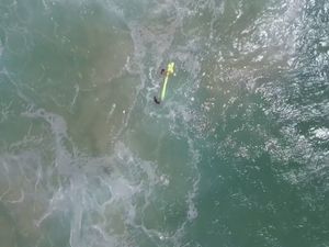 Supporting image for story: Watch a drone rescue two swimmers struggling in rough seas