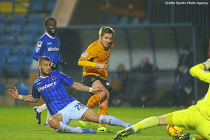 Kevin Doyle of Wolverhampton Wanderers and Max Ehmer of Carlisle United.