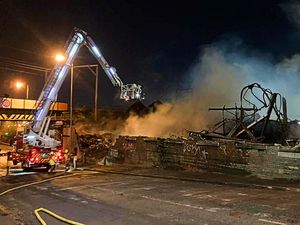 Supporting image for story: Firefighters still at scene of Wolverhampton blaze as trains resume after wall demolition