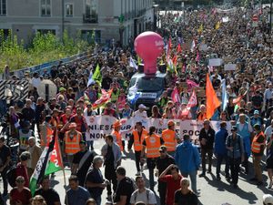 Supporting image for story: France hit by protests and strikes over Macron’s public service cuts