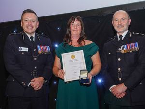 Supporting image for story: Wolverhampton post-office worker who stood up to armed robber is honoured