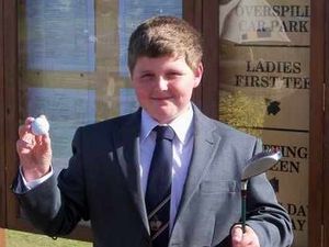 Supporting image for story: Boy golfer is a hole-in-one machine
