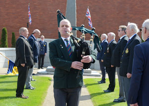 Piper Alan Kirby at the war memorial in Market Drayton