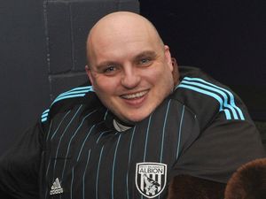 Supporting image for story: Baggies players and staff donate money in respected ref's name