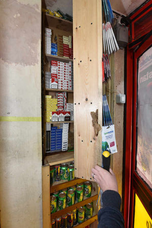 A secret compartment hiding cigarettes