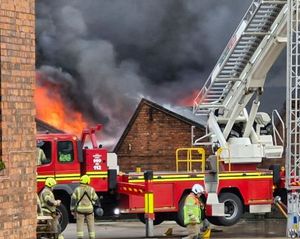Firefighters working at the scene