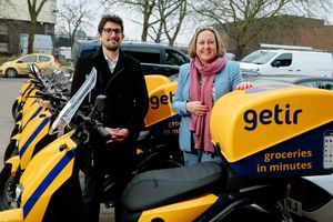 WOLVERHAMPTON COPYRIGHT EXPRESS & STAR JAMIE RICKETTS 24/01/2022 - The International Trade Secretary Anne-Marie Treveylan MP, visit Getir in Wolverhampton, a food delivery e-commerce company who has chosen the UK as its first overseas site. In Picture: Anne-Marie Trevelyan MP with Getir General Manager Turancan Salur.