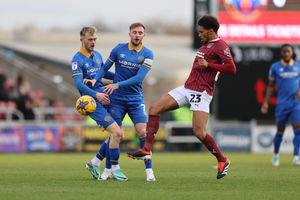Carl Winchester of Shrewsbury Town and Taylor Perry of Shrewsbury Town and William Hondermarck of Northampton Town (AMA)