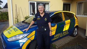Effie Cadwallader with the car from her days volunteering with the West Midlands Ambulance Service