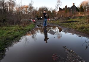 The 'mudbath' pathway leading to Riverside House, Stourbridge, which Lloyd Stacey says is a danger to visitors and needs to be repaired. Pictured is Lloyd Stacey - founder and director of Riverside House