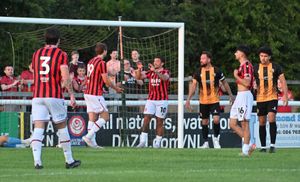 Josh Gordon celebrates Walsall's fourth goal with new strike partner Aaron Pressley.