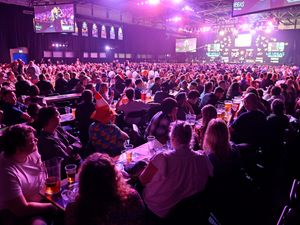 Supporting image for story: In pictures: Eight days of ecstasy ahead for arrows fans as Grand Slam of Darts begins in Wolverhampton