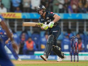 Gujarat Titans’ Jos Buttler plays a shot during an IPL match