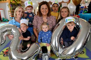 Farm Friends Day Nursery celebrated its 20th birthday on Tuesday. Pictured centre with staff and children is owner Lucy Cartwright.