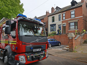Supporting image for story: Road sealed off as fire crews battle blaze in attic at Walsall house