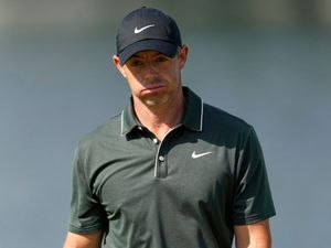 Rory McIlroy reacts after missing a putt on the 14th hole during the first round of the US PGA Championship