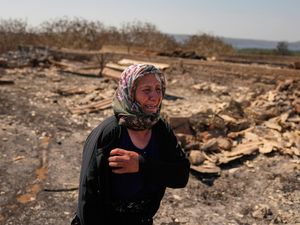 Supporting image for story: Parts of Europe burn as millions face record heat