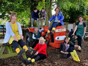 Supporting image for story: Farm staff donning yellow socks to raise awareness of youth loneliness
