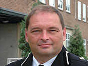 Supporting image for story: Police chief back as boss