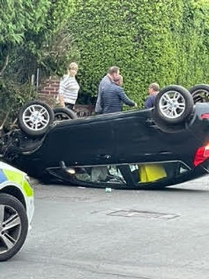 Residents of Keepers Lane came out to help the occupant of a car which crashed near their homes
