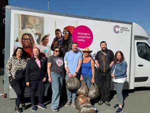 Jules and her members who helped load 405 bags into the van