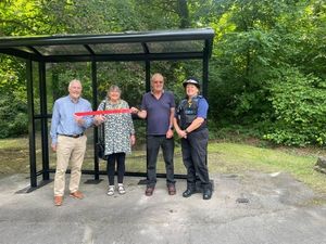 From left: Ian Cruise-Taylor (clerk at The Gorge Parish Council), Councillor Caroline Bagnall (Mayor of Broseley), Alan Taylor (chairman of The Gorge Parish Council) and PCSO Helen Scott open the new bus shelter in Calcutts Road, Jackfield. Picture: