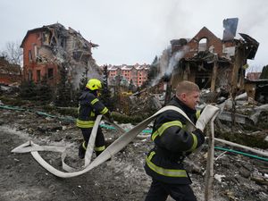 Supporting image for story: Russian missile and drone barrage hits Kyiv suburbs