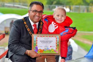 Raj Mehta with a special award for bravery that he gave to Zac