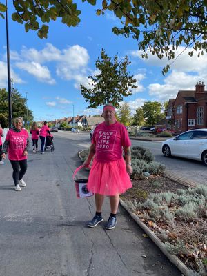 Mark, Laura's father, was persuaded to wear a pink tutu for the Race for Life