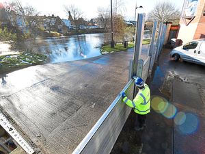 Supporting image for story: Flood barriers to stay up by River Severn in Shrewsbury as thaw continues