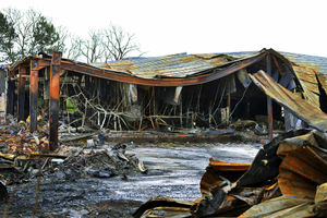 The charred remains of the former Strykers bowling alley, Shaw Road, Bushbury, which was gutted by fire, is now being demolished
