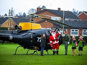 Supporting image for story: Video and pictures: Santa makes flying visit to Shrewsbury school