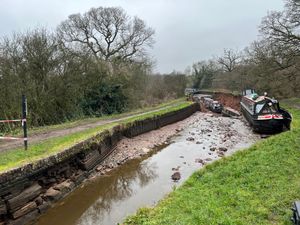 Supporting image for story: WATCH: Shocking moment Shropshire canal boat plunged into a 160ft-wide sinkhole