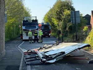 Supporting image for story: Road closed after double decker bus hits bridge in Clayhanger and roof is torn off