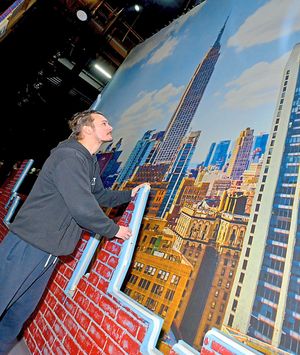 Mike Ward (Resident Director, associate choreographer) from Manchester, with the city backdro