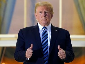 Supporting image for story: Donald Trump returns to White House without mask after hospital Covid treatment