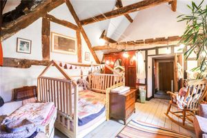 A children's bedroom with exposed timber, picture via: Nock Deighton and Rightmove