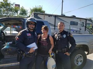 Supporting image for story: These cops are making people’s Thanksgiving by handing out turkeys instead of tickets