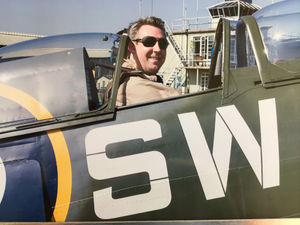 A beaming Alex after his birthday flight