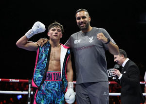 Morecambe's John Tom with Walsall Coach Shiney Singh